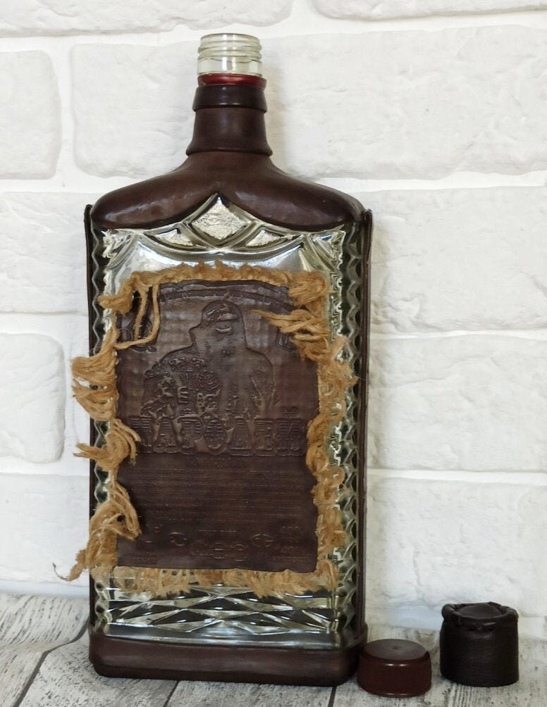 Vintage leather decorative glass bottle. Unique old bar decor. Etsy