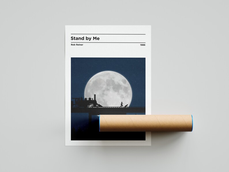 May include: A minimalist movie poster design for the film "Stand by Me" directed by Rob Reiner. The poster features a silhouette of a train crossing a bridge under a large, full moon.