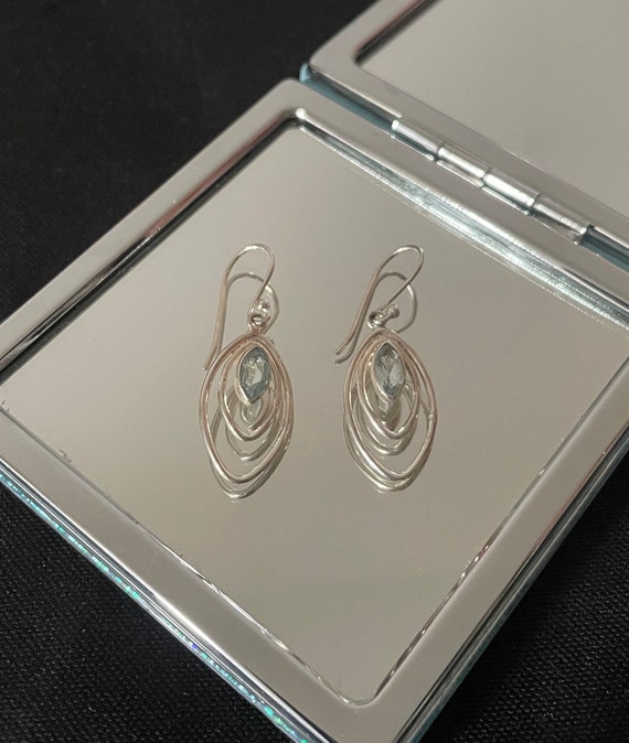 Blue Topaz Faceted Swirl Coil Design Sterling Silver Earrings Blue Topaz Faceted Swirl Coil Design Sterling Silver Earrings