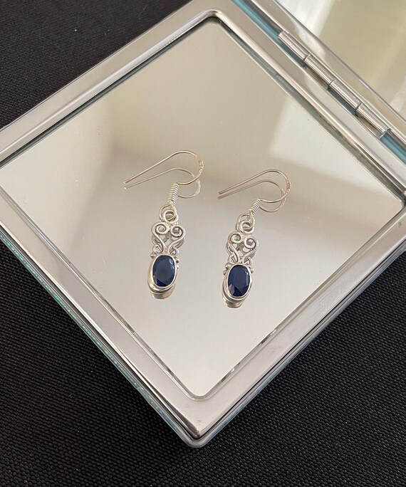 Blue Topaz Faceted Swirl Coil Design Sterling Silver Earrings Blue Topaz Faceted Swirl Coil Design Sterling Silver Earrings