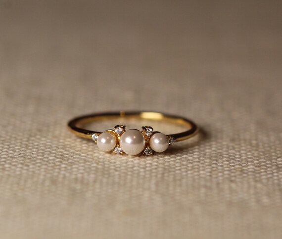 pearl ring design for female in gold