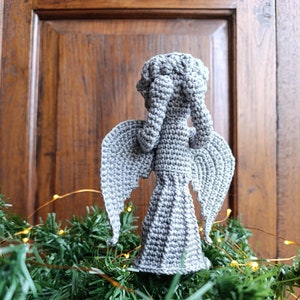 Mönster för julgranstoppning med gråtande änglar