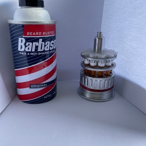 Jurassic Park Embryo Cryocan Replica with metallic barbasol can