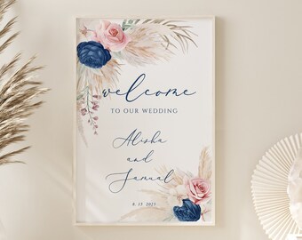 May include: A printable wedding welcome sign with a watercolor floral design in shades of pink, blue, and beige. The sign says "Welcome to our wedding Alisha and Jannal 8.15.2022"
