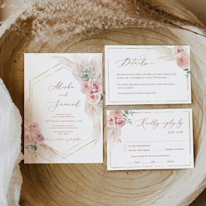 May include: Wedding invitation suite with a blush pink and gold color scheme. The invitation features a geometric frame with the names "Alisha and Jennel" and a floral design. The RSVP card includes a response section and a meal choice option.