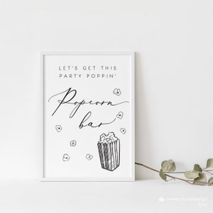 K&ouml;nnte beinhalten: Schwarzwei&szlig;es druckbares Schild mit dem Text "Let's get this party poppin' Popcorn bar". Das Schild zeigt eine Zeichnung eines Popcornbeh&auml;lters mit herausfallendem Popcorn.