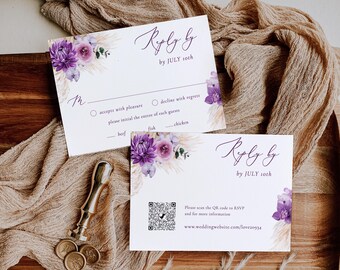 May include: Purple and white floral wedding RSVP cards with a QR code for guests to RSVP online. The text on the card reads "Reply by July 10th".