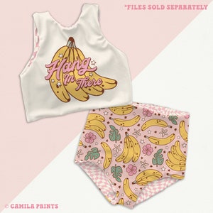 May include: A white crop top with a pink "Hang in There" graphic featuring bananas and stars. A pink and white checkered bottom with a banana print.