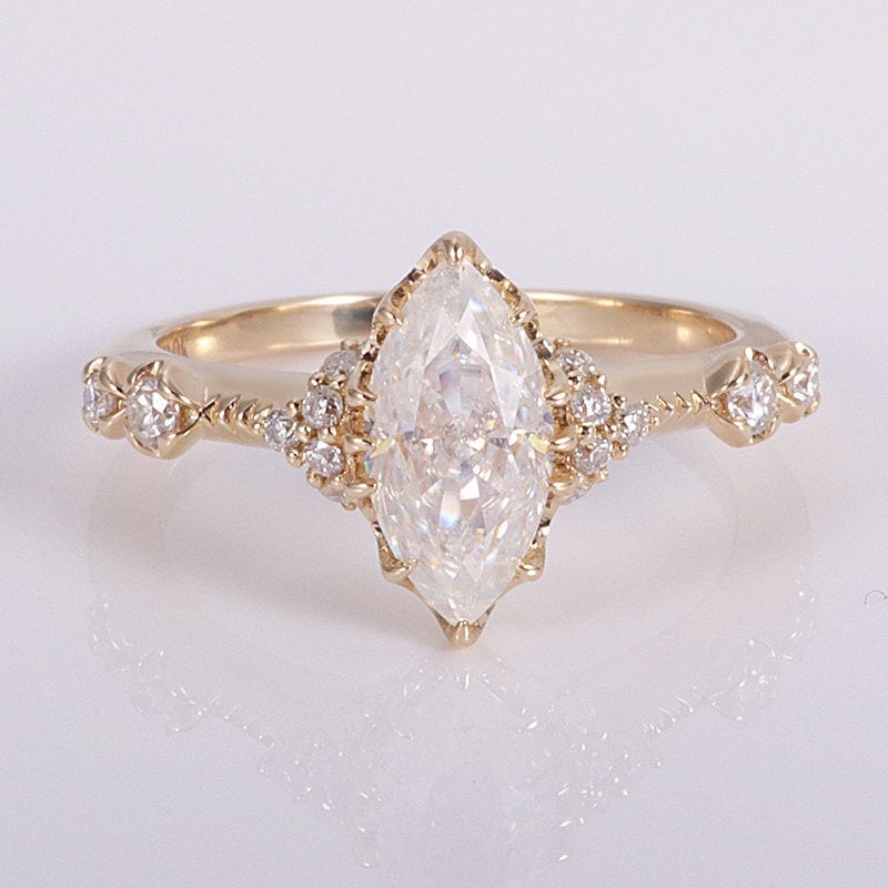 Unique marquise diamond best sale settings