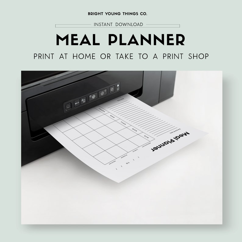 May include: A black and white printable meal planner with the text "Meal Planner" printed on the page. The planner is being printed from a black printer.