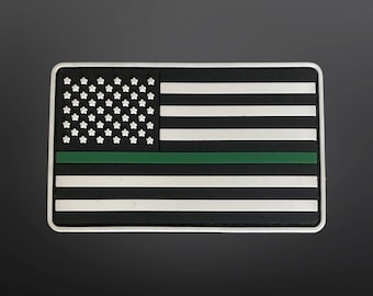 Cienka zielona łatka z flagą amerykańską z PVC, 3,5” dł. x 2” wys., honorująca personel wojskowy