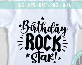 May include: White t-shirt with black text that reads "Birthday Rock Star!" with stars on either side of the text.