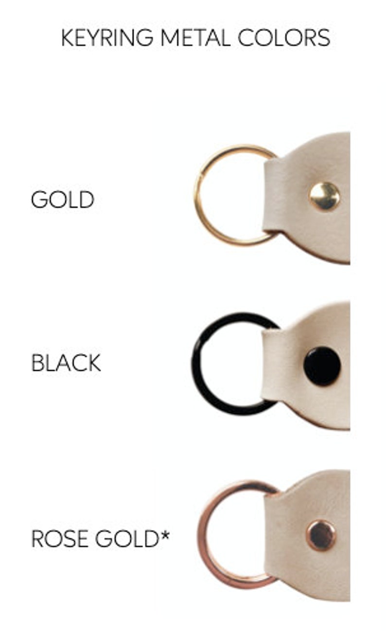 May include: Keyring metal colors: gold, black, and rose gold. Each keyring features a leather strap with a metal ring and a small metal button.