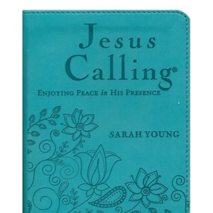 May include: A teal-colored book titled "Jesus Calling" with embossed floral and paisley designs. The cover also includes the text "Enjoying Peace in His Presence" and the author's name, "Sarah Young."