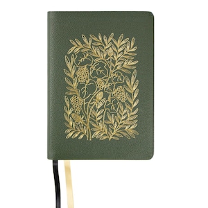 May include: A green leather journal with a gold embossed floral design. The journal has a black ribbon bookmark and a gold ribbon bookmark.
