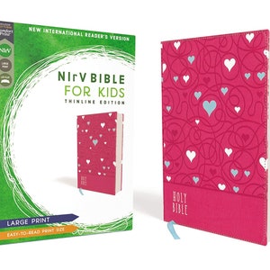 May include: A pink and white Bible with a heart pattern on the cover. The title reads "NIV Bible for Kids Thinline Edition". The Bible is packaged in a green box with the same title and a large print label.