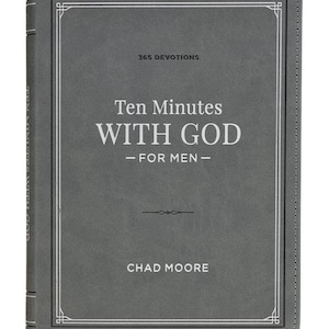 May include: A grey book with the title "Ten Minutes With God - For Men - 365 Devotions" by Chad Moore. The book has a white border and text, with the title in large, bold letters. The book's spine reads "Ten Minutes With God".