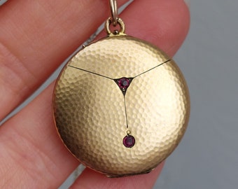 Art Nouveau Textured Surface Gold Locket with Red Ruby Pastes