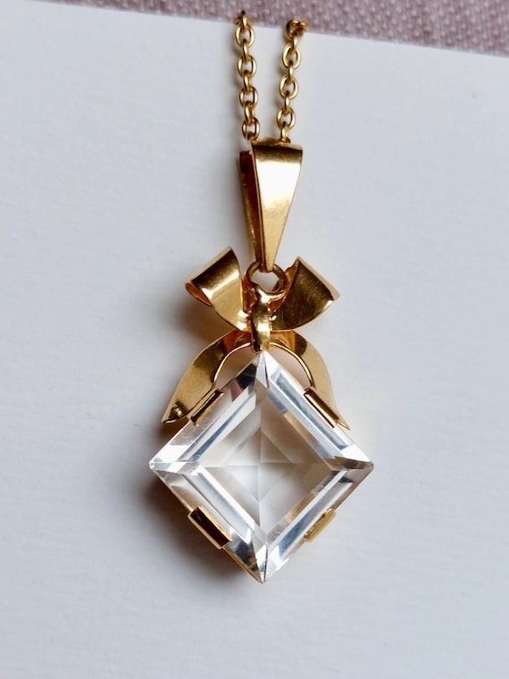 1947 Swedish 18k Gold pendant with a faceted Rock Crystal