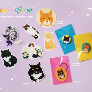 May include: A collection of cat-themed stickers, magnets, and pin-back buttons. The items feature illustrations of cats with different expressions and colors. The text "Grouchy Cat co. visit my shop for more items!" is visible at the top of the image.