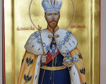 May include: A hand-painted icon of Tsar Nicholas II of Russia, wearing a crown and royal robes. The icon is set against a gold background and includes the text "Царь Николай" (Tsar Nikolai) and "Св страстотерпец" (Saint Passion-Bearer).