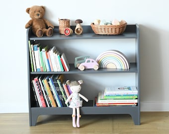 a Montessori toy shelf, children's bookcase, toddlers bookshelf