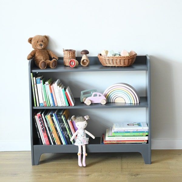 a Montessori toy shelf, children's bookcase, toddlers bookshelf