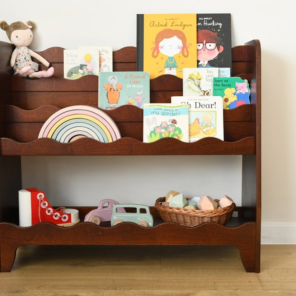 a front facing, Montessori bookcase for children, in dark brown stain
