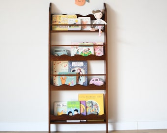 a montessori bookshelf for kids, a tall montessori bookcase