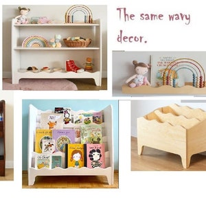 May include: A collection of wooden bookcases with wavy shelves, some with books and toys. The same wavy decor.