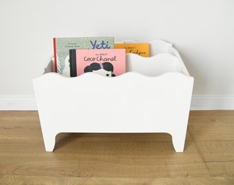 A montessori bookshelf for nursery, a small kids wooden bookcase, a box for toys, books storage