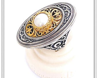 Byzantine style statement ring with pearl made of oxidized Sterling Silver and a 18 karat Gold Filled silver setting with floral decoration.