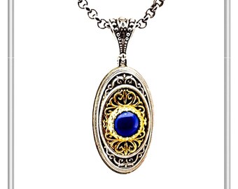 Lapis Lazuli pendant in Byzantine style made of oxidized Sterling Silver and a 18 karat Gold Filled silver setting with floral decoration.
