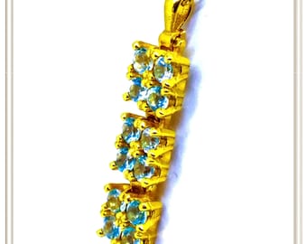 Blue topaz brilliant pave pendant made of sterling silver 18 karat gold filled with amethyst, peridot, dark red garnet or sky blue topaz.