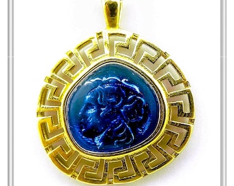 Alexander the Great coin silver necklace with Greek key 18 karat gold filled decoration. Oxidized silver coin covered with sky blue enamel.