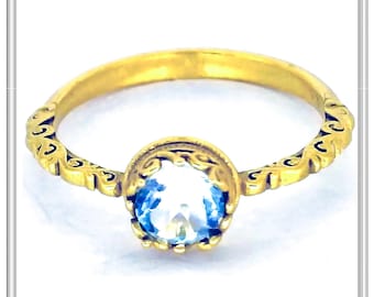 18 karat solid gold statement ring, genuine sky-blue topaz on byzantine filigree decorated  gold bezel, stacking ring with natural stones.