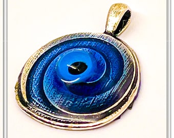 Evil Eye Spiral Talisman Necklace: Sky Blue Transparent  Enamel on Oxidised Sterling Silver