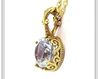 18 karat solid gold Sky blue natural topaz Byzantine pendant, filigree Byzantine handmade charm with blue topaz made of 18 karat solid gold.