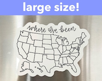 May include: A white sticker in the shape of the United States with black outlines of the states. The text "where I've been" is written in cursive above the map. The text "large size!" is in a blue rectangle above the map.