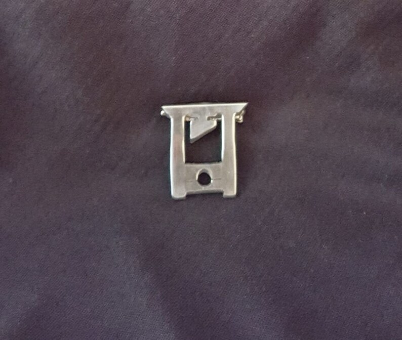 The Chop recycled aluminum lapel pin