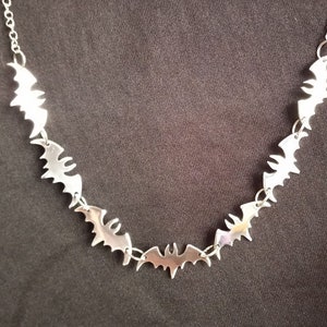 Seven Bats recycled aluminum necklace