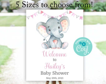 May include: A welcome sign for a baby shower with a cute cartoon elephant illustration. The sign says "Welcome to Hailey's Baby Shower May 29th, 2021".