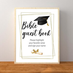 May include: A printable sign with a gold frame and a black graduation cap. The text reads "Bible guest book" and "Please highlight your favorite verse and sign your name".