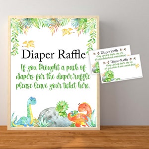 May include: A sign with a green and white dinosaur theme that says "Diaper Raffle. If you brought a pack of diapers for the diaper raffle please leave your ticket here." There are two smaller cards that say "Diaper Raffle. Bring a pack of diapers, any size, for your chance to win a special prize."