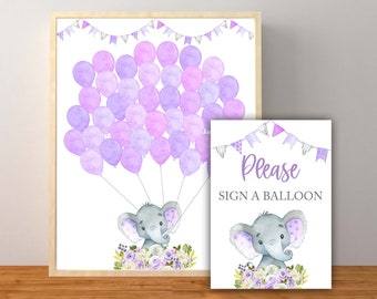 May include: Purple and lavender balloons with a gray elephant holding the strings. The sign says "Please sign a balloon".