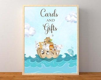 May include: A blue and white sign with the text "Cards and Gifts" in brown lettering. A cartoon ark with animals on it is floating on blue water with white clouds in the background.