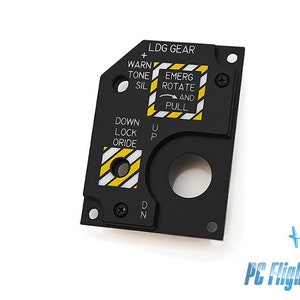 May include: Black control panel with white and yellow text, including "LDG GEAR", "EMERG ROTATE AND PULL", and "DOWN LOCK ORIDE". The panel has a circular opening and is secured with screws. The PC Flights logo is in the bottom right corner.