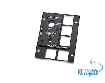 May include: Black metal panel with a round toggle switch labeled "MAIN PWR" and "BATT".  The panel also has a rectangular toggle switch labeled "OFF" and "CAUTION RESET".  The panel has a rectangular cutout labeled "ACFT BATT".