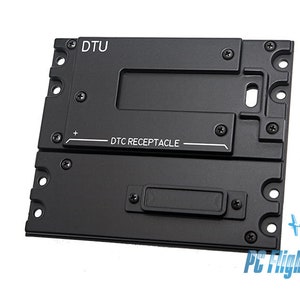 May include: Black metal panel with the text "DTU" and "DTC RECEPTACLE" printed on it. The panel has several screw holes and a rectangular cutout.