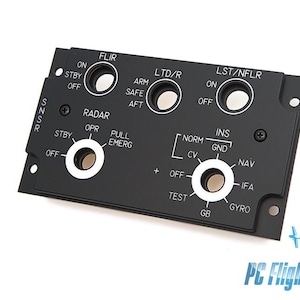 May include: Black metal panel with various switches and knobs, including FLIR, LTD/R, LST/NFLR, RADAR, INS, and NAV. The panel has white lettering and markings.